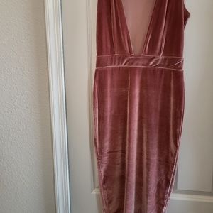 A low cut velveteen bodycon